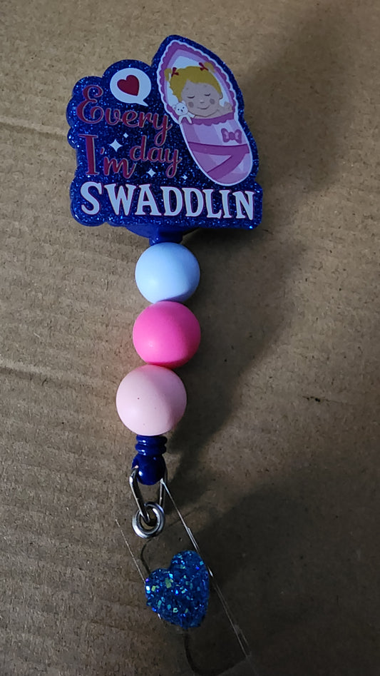 Swaddle Badge Reel