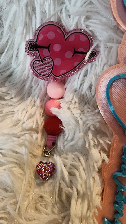 Heart badge reel